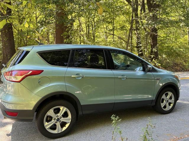 Photo of 2013 Turquoise Ford Escape
