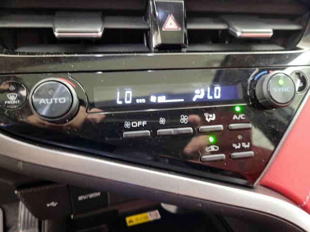 Photo of 2024 Black Toyota Camry Hybrid
