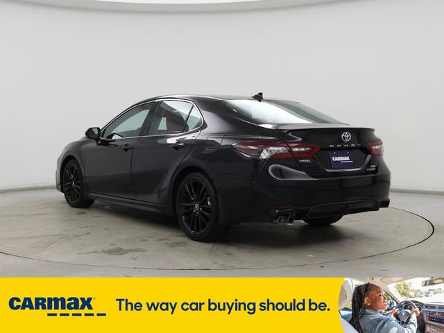 Photo of 2024 Black Toyota Camry Hybrid