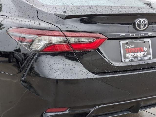 Photo of 2023 Midnight Black Toyota Camry