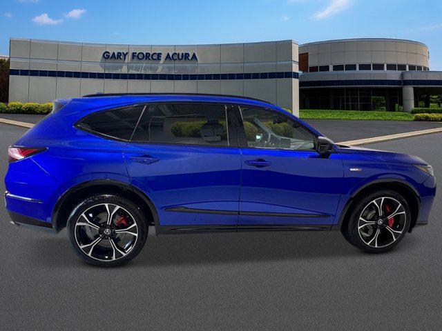 Photo of 2025 Apex Blue Pearl Acura MDX