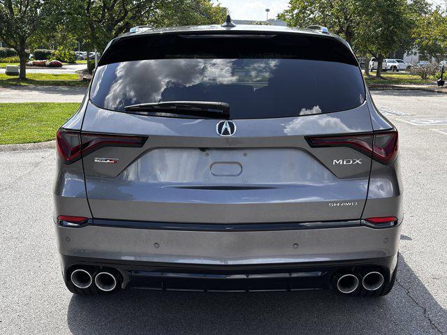 Photo of 2024 Liquid Carbon Metallic Acura MDX