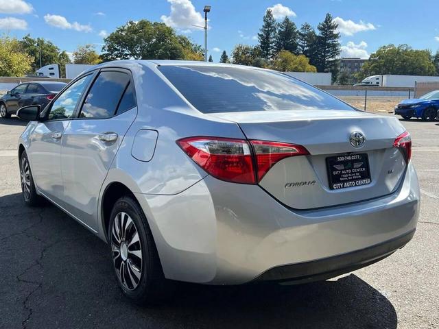 Photo of 2015 Classic Silver Metallic Toyota Corolla