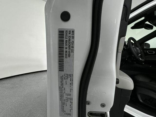 Photo of 2024 Bright White Clearcoat Jeep Compass