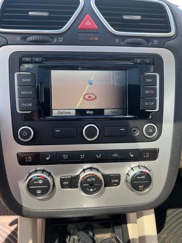 Photo of 2014 Black Oak Brown Metallic Volkswagen Eos