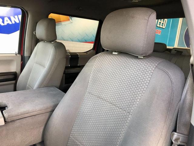 Photo of 2015 Ruby Red Metallic Tinted Clearcoat Ford F-150
