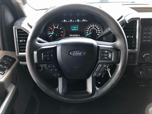 Photo of 2015 Ruby Red Metallic Tinted Clearcoat Ford F-150