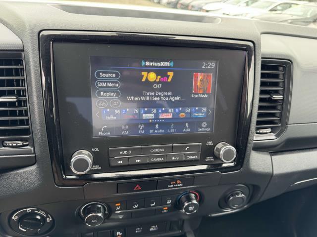Photo of 2023 Glacier White Nissan Frontier