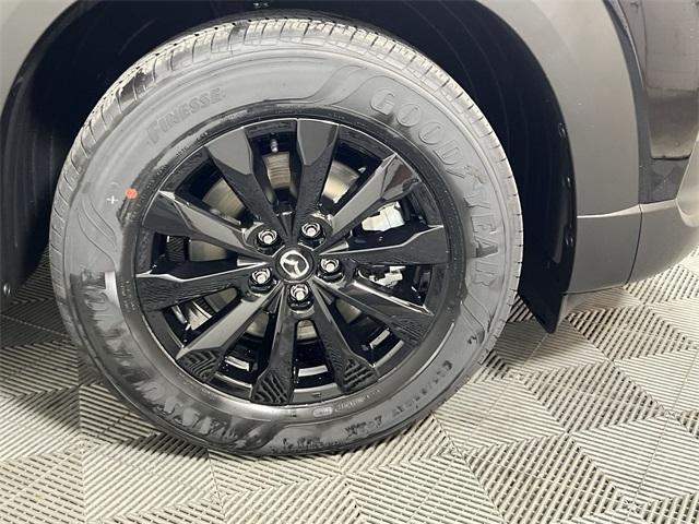 Photo of 2025 Jet Black Mica Mazda CX-50