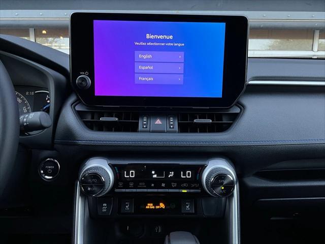 Photo of 2025 Cavalry Blue/Midnight Black Toyota RAV4 Hybrid