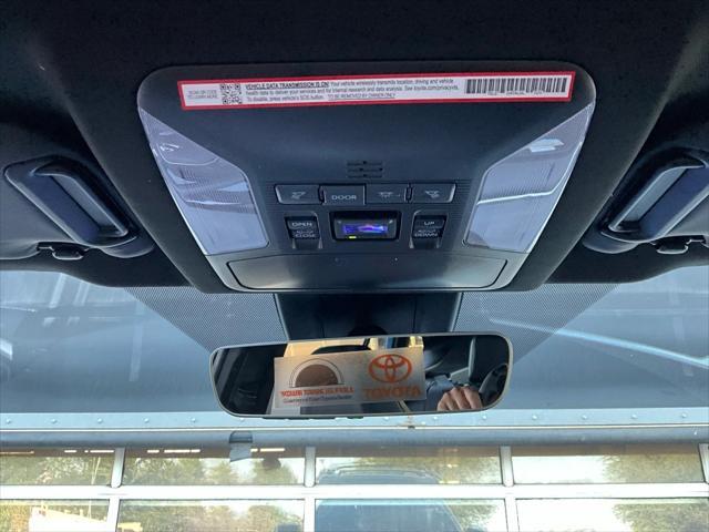 Photo of 2025 Cavalry Blue/Midnight Black Toyota RAV4 Hybrid