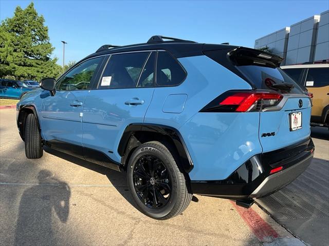 Photo of 2025 Cavalry Blue/Midnight Black Toyota RAV4 Hybrid