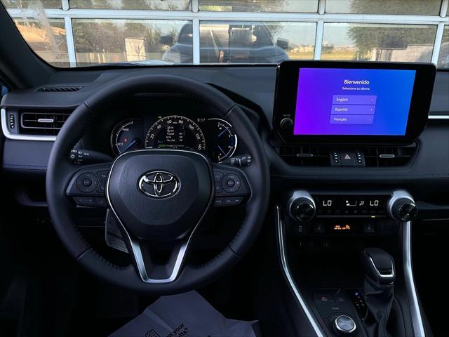 Photo of 2025 Cavalry Blue/Midnight Black Toyota RAV4 Hybrid