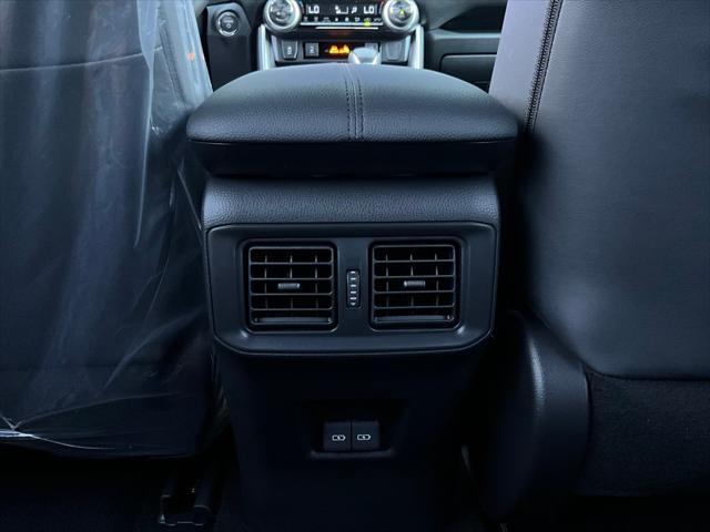 Photo of 2025 Cavalry Blue/Midnight Black Toyota RAV4 Hybrid