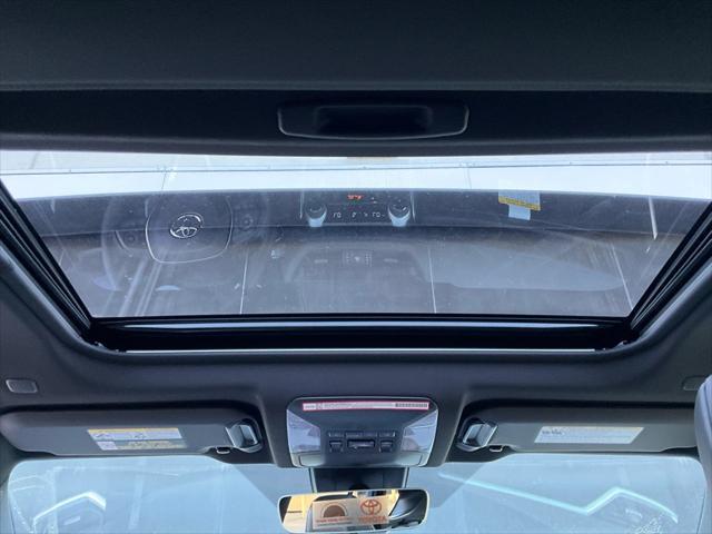 Photo of 2025 Cavalry Blue/Midnight Black Toyota RAV4 Hybrid