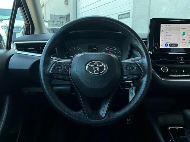 Photo of 2024 Midnight Black Metallic Toyota Corolla