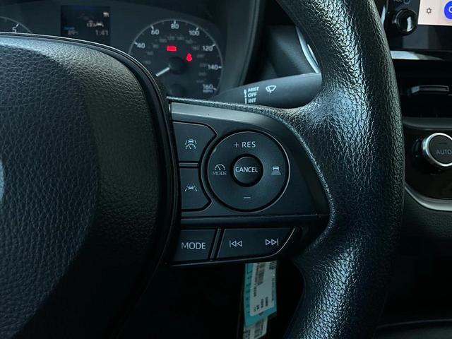 Photo of 2024 Midnight Black Metallic Toyota Corolla