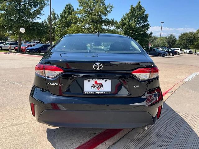 Photo of 2024 Midnight Black Metallic Toyota Corolla