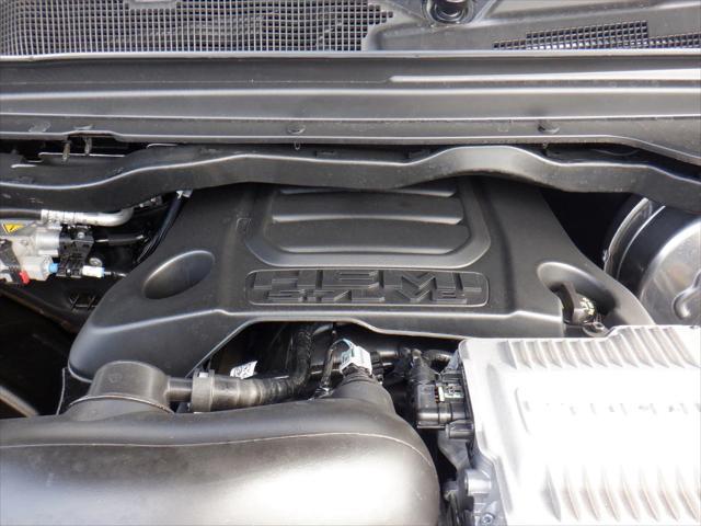 Photo of 2024 Diamond Black Crystal Pearlcoat RAM 1500