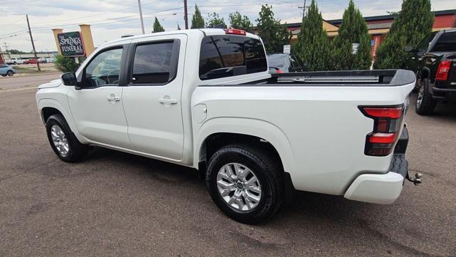 Photo of 2023 Glacier White Nissan Frontier