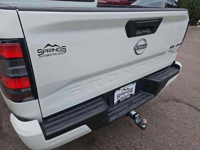 Photo of 2023 Glacier White Nissan Frontier