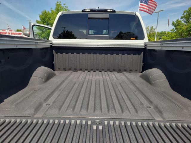 Photo of 2024 Glacier White Nissan Titan