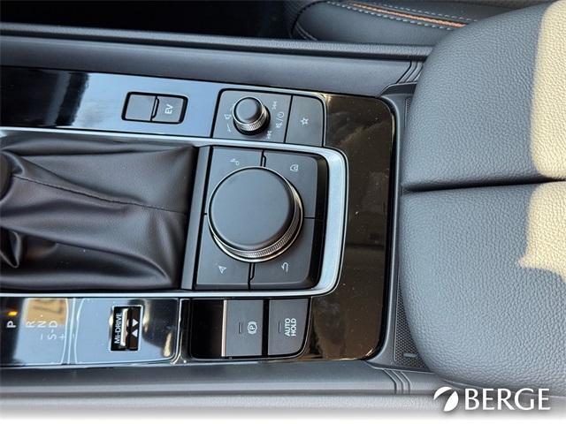 Photo of 2025 Soul Red Mazda CX-50 Hybrid