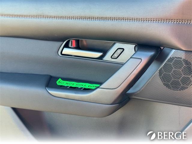 Photo of 2025 Soul Red Mazda CX-50 Hybrid