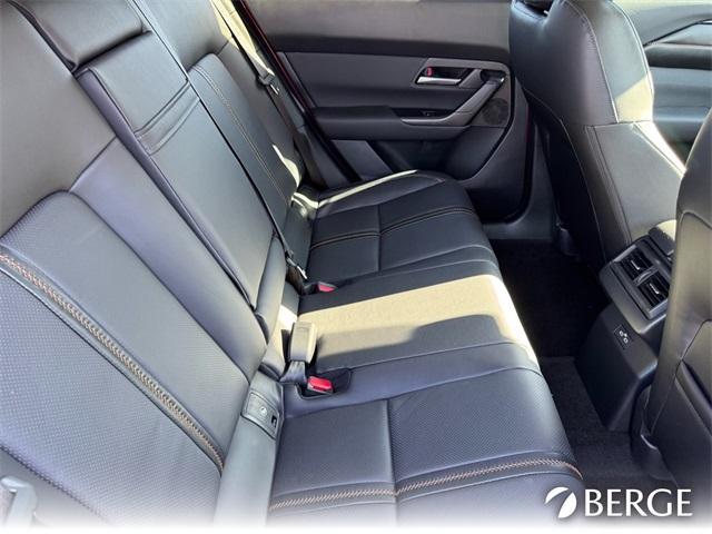 Photo of 2025 Soul Red Mazda CX-50 Hybrid