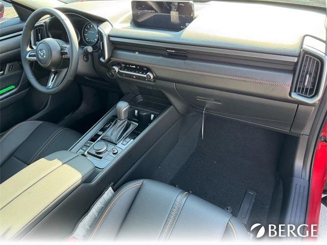Photo of 2025 Soul Red Mazda CX-50 Hybrid