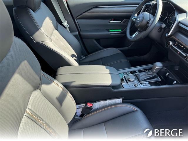 Photo of 2025 Soul Red Mazda CX-50 Hybrid