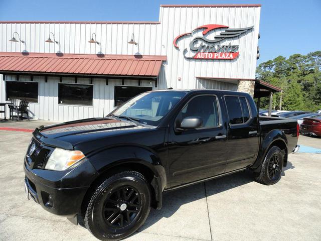 Photo of 2016 Magnetic Black Nissan Frontier