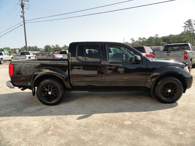 Photo of 2016 Magnetic Black Nissan Frontier
