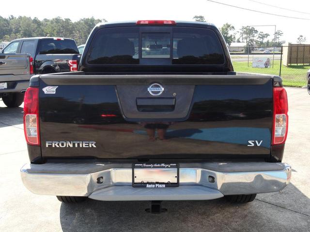 Photo of 2016 Magnetic Black Nissan Frontier