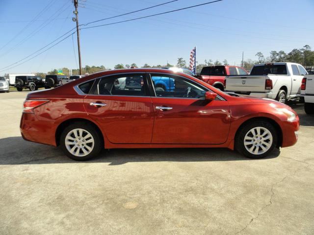 Photo of 2015 Cayenne Red Nissan Altima
