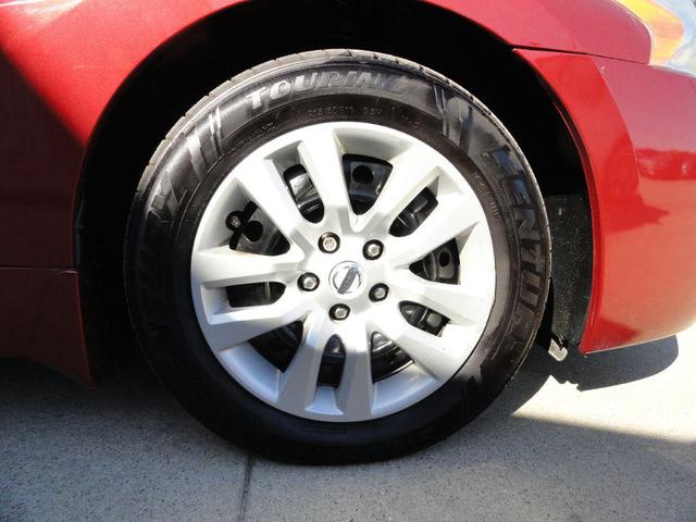 Photo of 2015 Cayenne Red Nissan Altima