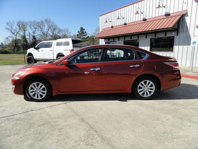 Photo of 2015 Cayenne Red Nissan Altima