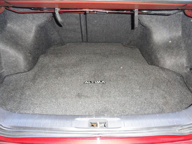 Photo of 2015 Cayenne Red Nissan Altima