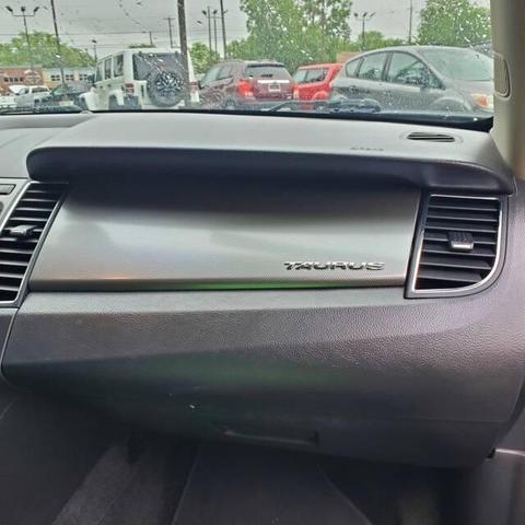 Photo of 2012 Cinnamon Metallic Ford Taurus
