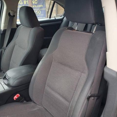 Photo of 2012 Cinnamon Metallic Ford Taurus