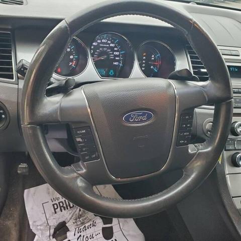 Photo of 2012 Cinnamon Metallic Ford Taurus