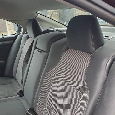 Photo of 2012 Cinnamon Metallic Ford Taurus