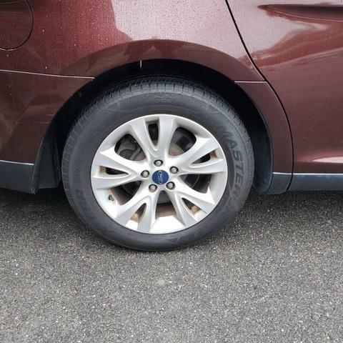 Photo of 2012 Cinnamon Metallic Ford Taurus