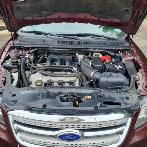 Photo of 2012 Cinnamon Metallic Ford Taurus