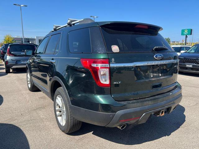 Photo of 2013 Green Ford Explorer