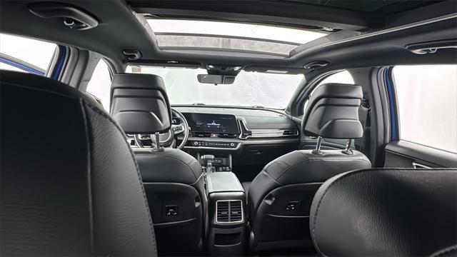 Photo of 2023 Sapphire Blue Kia Sportage