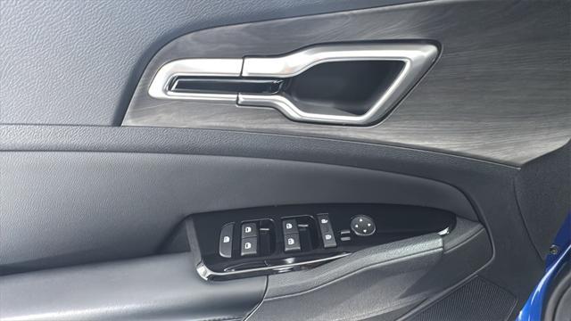 Photo of 2023 Sapphire Blue Kia Sportage