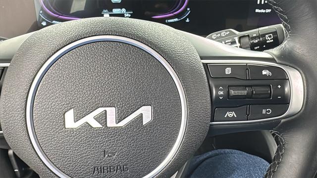 Photo of 2024 Sapphire Blue Kia Sportage