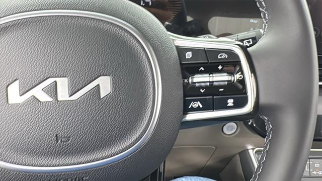 Photo of 2026 Snow White Pearl Kia Carnival Hybrid