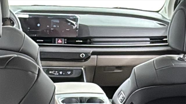 Photo of 2026 Snow White Pearl Kia Carnival Hybrid